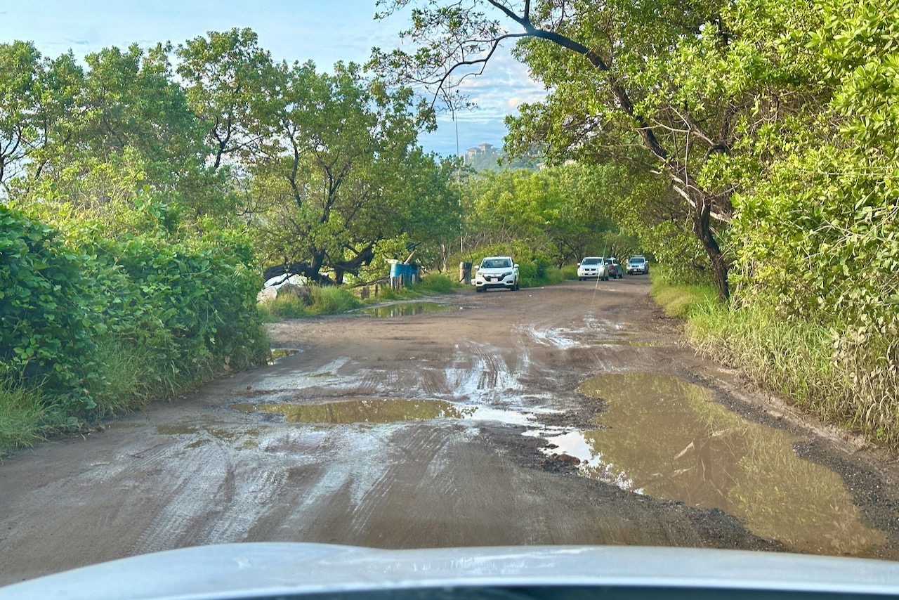 Green season potholes on the dirt roads