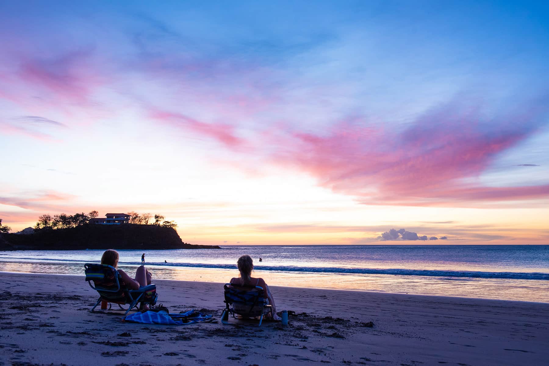 Cody's wife and mom watching the sunset at Flamingo Beach